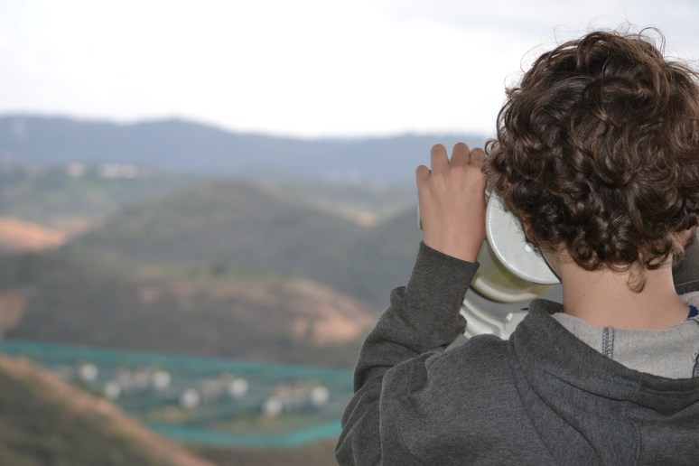 Looking through telescope at the enclosures at the National Captive breeding centre in Silves